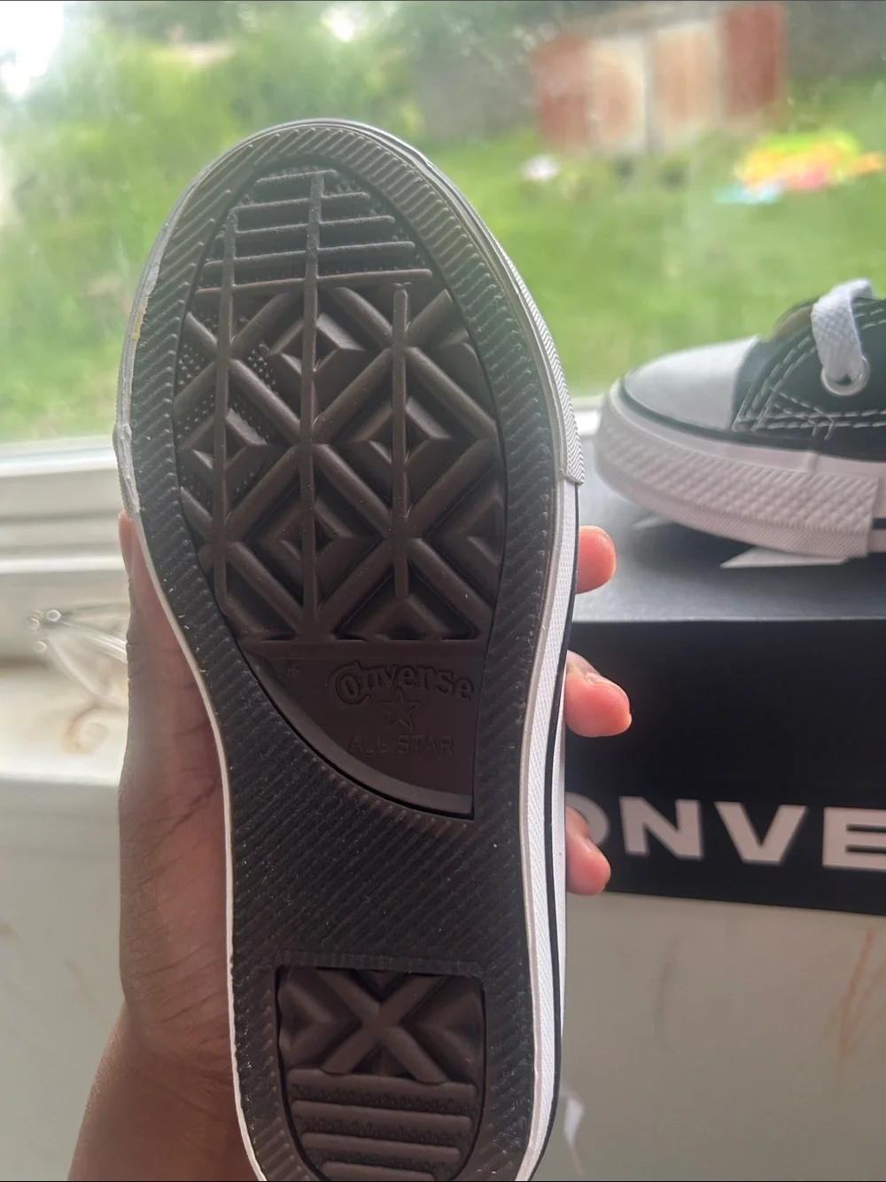 Converse Kids Low Top Sneaker in Black and White